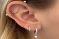 ___-piercing (annoyingly loud)